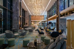 Uma área de estar em Anara Airport Hotel