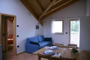 A seating area at Apartment Valdisole