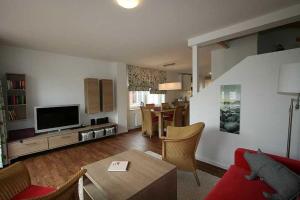 Et tv og/eller underholdning på Feriendorf Robbenplatte Burhave 4