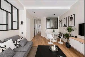 Posezení v ubytování Appartement design et minimaliste prado castellane
