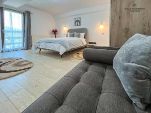 Кровать или кровати в номере Casa Popescu