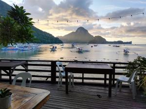 a view of a lake with boats in the water at Joyful Guest House in El Nido