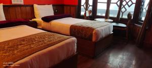 The Rope Resorts客房内的一张或多张床位