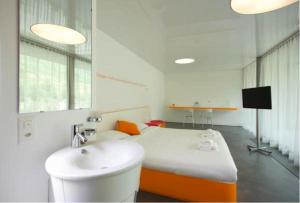 Un baño de Chromotel self check-in