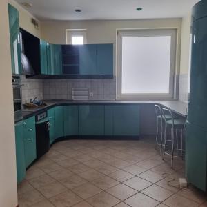 Kuchyň nebo kuchyňský kout v ubytování Figaro Apartaments
