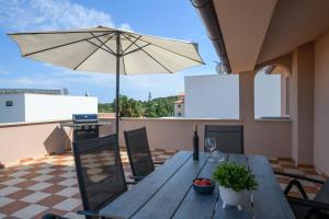 Balkon lub taras w obiekcie Livin Large Ana