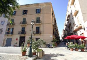 a street light in front of a building at Alla Marina Bed And Breakfast in Trapani