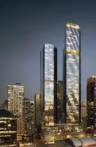 a city skyline with two tall skyscrapers at WSP luxury 2b2b apartment in CBD with free parking in Melbourne