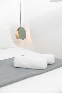 Posteľ alebo postele v izbe v ubytovaní Galante Apartment