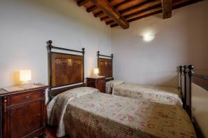 Letto o letti in una camera di Melograno Poderone