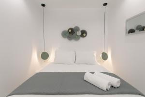 Posteľ alebo postele v izbe v ubytovaní Galante Apartment