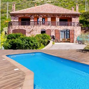 Bazén v ubytování Villa Luna e' Pedra - Suite in Villa con Vista sulla Baia di Alghero e Piscina nebo v jeho okolí