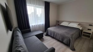Postel nebo postele na pokoji v ubytování Prangli sadama majutus + 13 fotografií