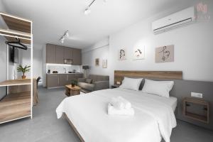 P30, Nilie Hospitality MGMT tesisinde bir odada yatak veya yataklar
