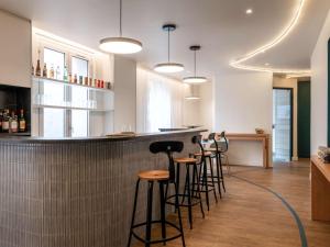 Lounge nebo bar v ubytování ibis Styles Asnieres Centre