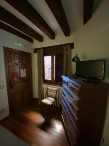 TV a/nebo společenská místnost v ubytování La Hoja de Roble