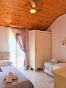 Postel nebo postele na pokoji v ubytování Villa Natura