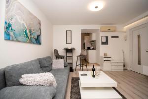 Posezení v ubytování Oasis apartment
