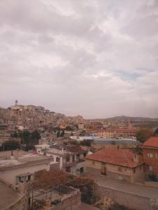 a view of a city with houses and buildings at Cappadocia Alaz Cave Otel in Nevşehir