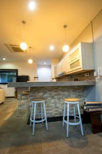 A kitchen or kitchenette at Villa Cinta Buana2