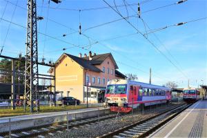 two trains on the tracks in a train station at Studio Hadersdorf near Train station with Free Parking in Hadersdorf am Kamp