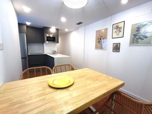 A kitchen or kitchenette at Expoholidays - Apartamento Rueda Lopez (7ºB)