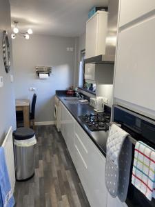 Nhà bếp/bếp nhỏ tại Minnie's Cottage