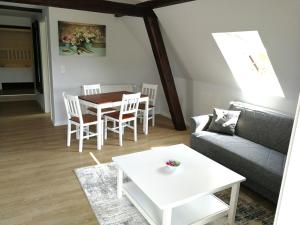 Posezení v ubytování Pension Schlossblick Thallwitz + 15 fotografií