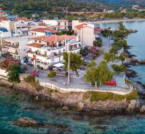 an aerial view of a town on the water at Magda Rooms ''Sea View'' in Neos Marmaras