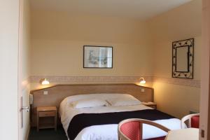 Postel nebo postele na pokoji v ubytování Hotel Des Bains