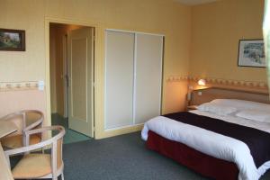 Postel nebo postele na pokoji v ubytování Hotel Des Bains