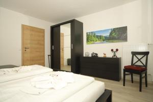 Posteľ alebo postele v izbe v ubytovaní Haus Schroffenstein + 37 fotografií
