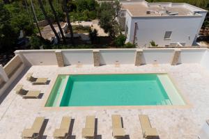 The swimming pool at or close to Villa Finibus Terrae