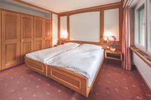 Postel nebo postele na pokoji v ubytování Antares Hotel