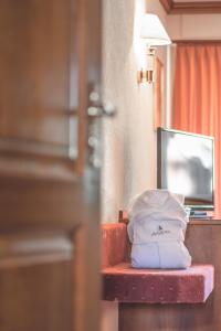 Postel nebo postele na pokoji v ubytování Antares Hotel