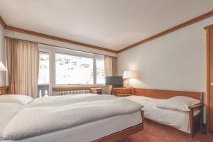 Postel nebo postele na pokoji v ubytování Antares Hotel