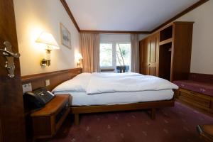 Postel nebo postele na pokoji v ubytování Antares Hotel