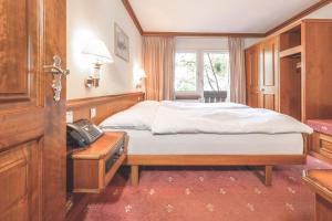 Postel nebo postele na pokoji v ubytování Antares Hotel