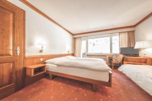 Postel nebo postele na pokoji v ubytování Antares Hotel