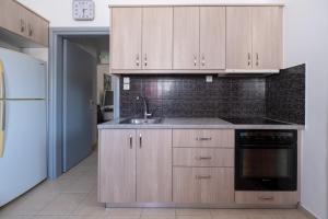 A kitchen or kitchenette at Adelphi Apartments