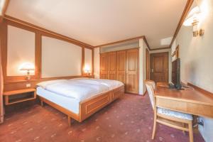 Postel nebo postele na pokoji v ubytování Antares Hotel