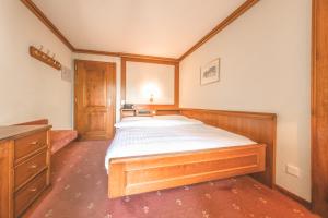 Postel nebo postele na pokoji v ubytování Antares Hotel