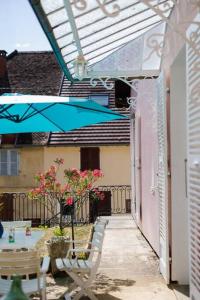 Patio nebo venkovní prostory v ubytování L'Anjépie