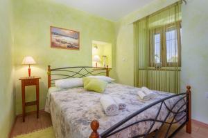 Posteľ alebo postele v izbe v ubytovaní Villa Katarina + 30 fotografií