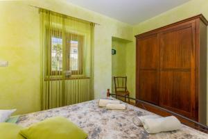 Posteľ alebo postele v izbe v ubytovaní Villa Katarina