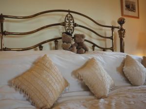 Postel nebo postele na pokoji v ubytování Smiddy Cottage + 18 fotografií