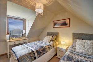 Un pat sau paturi într-o cameră la St Clements View