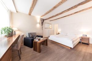 Postel nebo postele na pokoji v ubytování Boutique Hotel Zum Rosenbaum