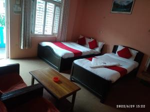 Cama o camas de una habitación en HOTEL ICE VIEW POKHARA