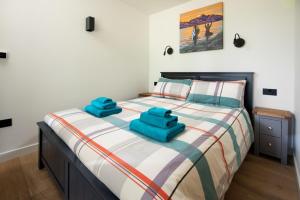 Postel nebo postele na pokoji v ubytování Am Bothan